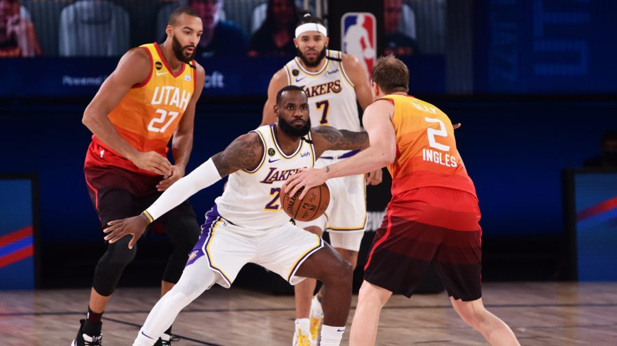 Orlando, FL - AUGUST 3: LeBron James #23 of the Los Angeles Lakers plays defense during the game against the Utah Jazz during a game on August 3, 2020 at The Arena at ESPN Wide World Of Sports Complex in Orlando, Florida. NOTE TO USER: User expressly acknowledges and agrees that, by downloading and/or using this Photograph, user is consenting to the terms and conditions of the Getty Images License Agreement. Mandatory Copyright Notice: Copyright 2020 NBAE (Photo by David Dow/NBAE via Getty Images)