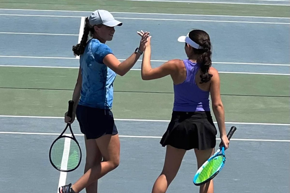 Hailey and Taryn playing doubles together