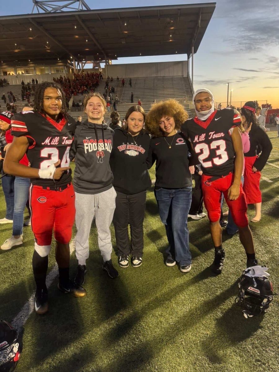 The Davis twins, Addie Clark, Keira Socquet, and Veradee Phillips after a game (courtesy of Addie Clark)