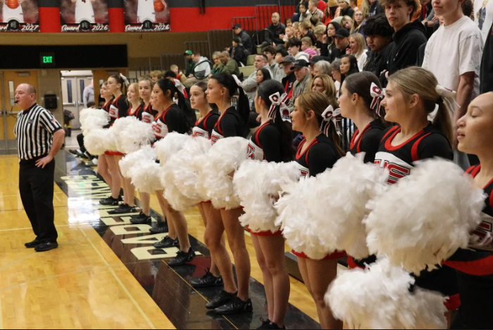 he CHS basketball cheer team filling the gym with cheer and hype (courtesy of Lacamas Yearbook)